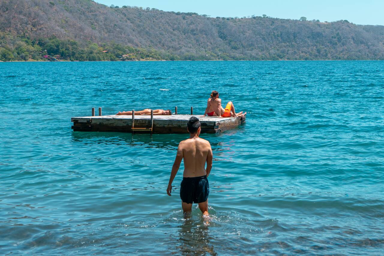 Me walking in the water to a plaform at Coco Bay Hostel