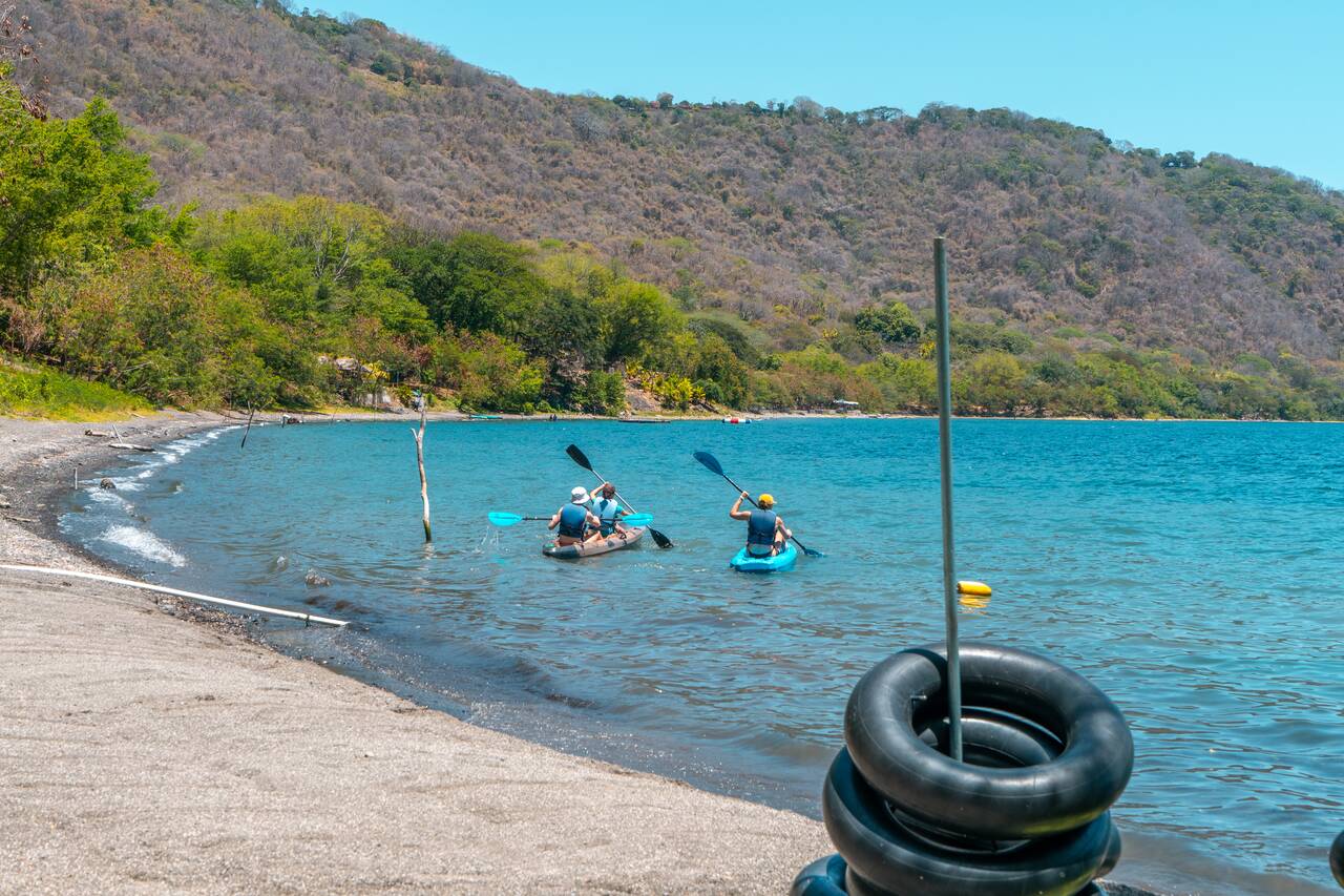 People kayaking at Laguna de Apoyo