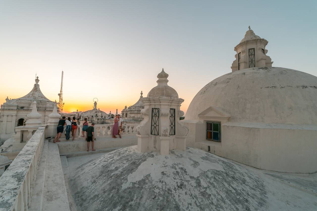 People watching the sunset at the rooftop of Basilica of the Assumption of the Blessed Virgin Mary