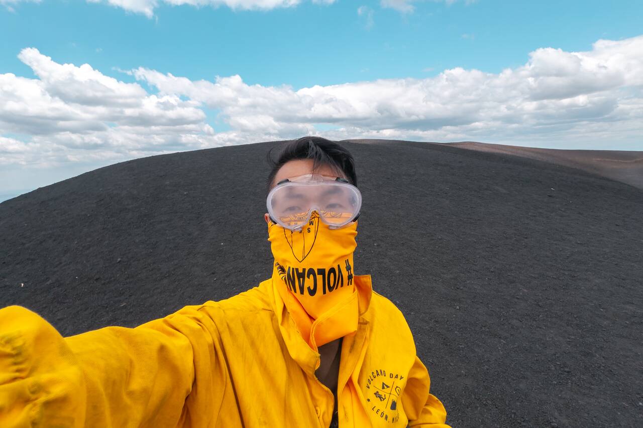 Me with a goggle and a bandana on before sliding down Cerro Negro