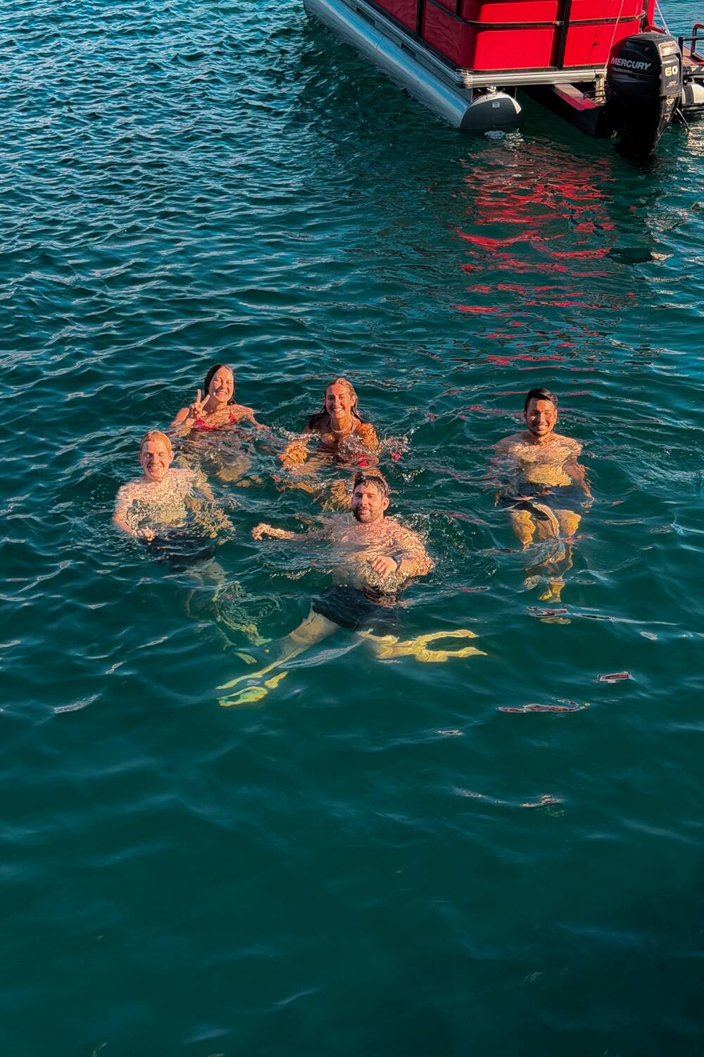 Me and my friends swimming at Lake Coatepeque