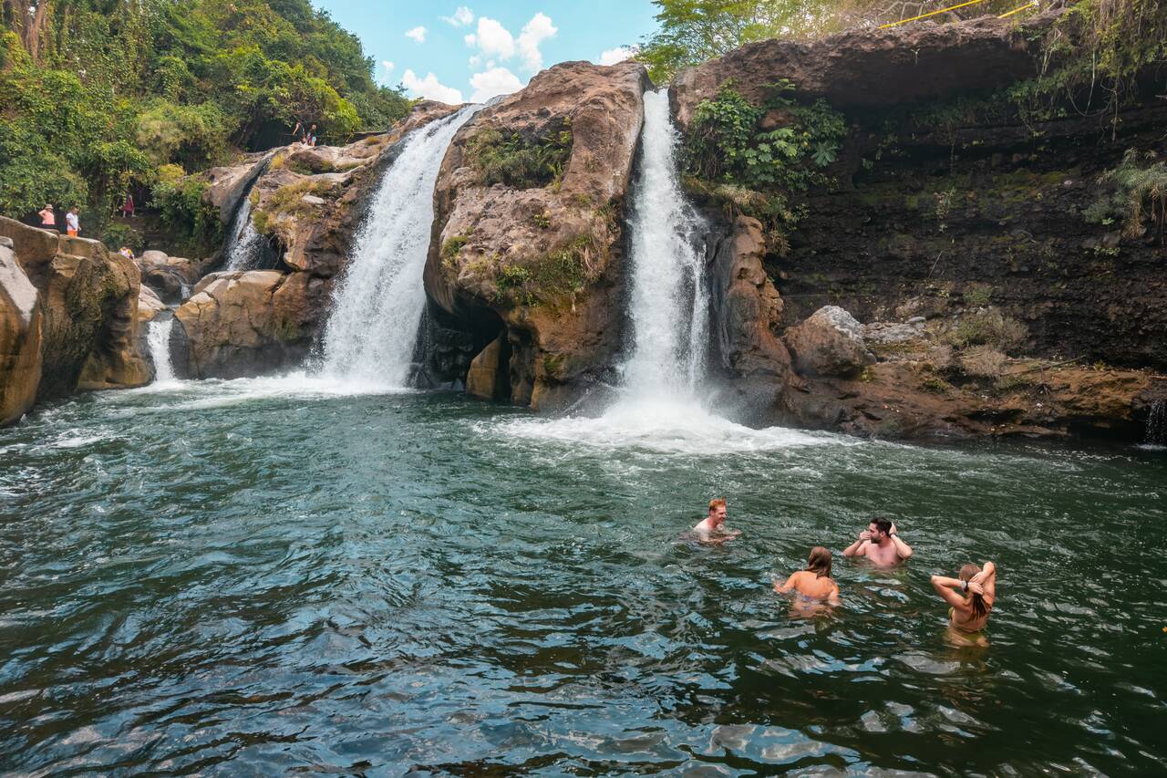 My friends swimming in the water at El Salto de Malacatiupán