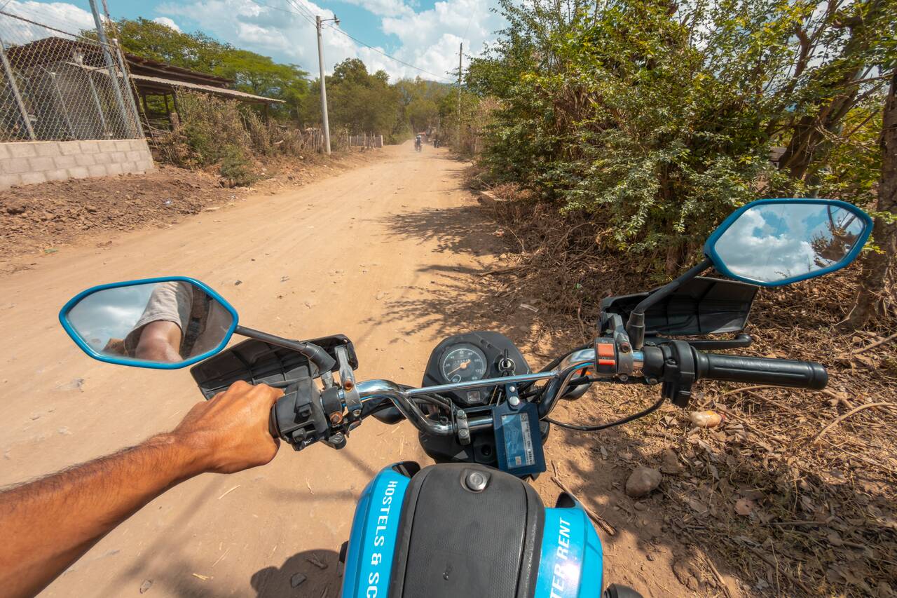 Me riding a motorbike to Ruta de las Flores