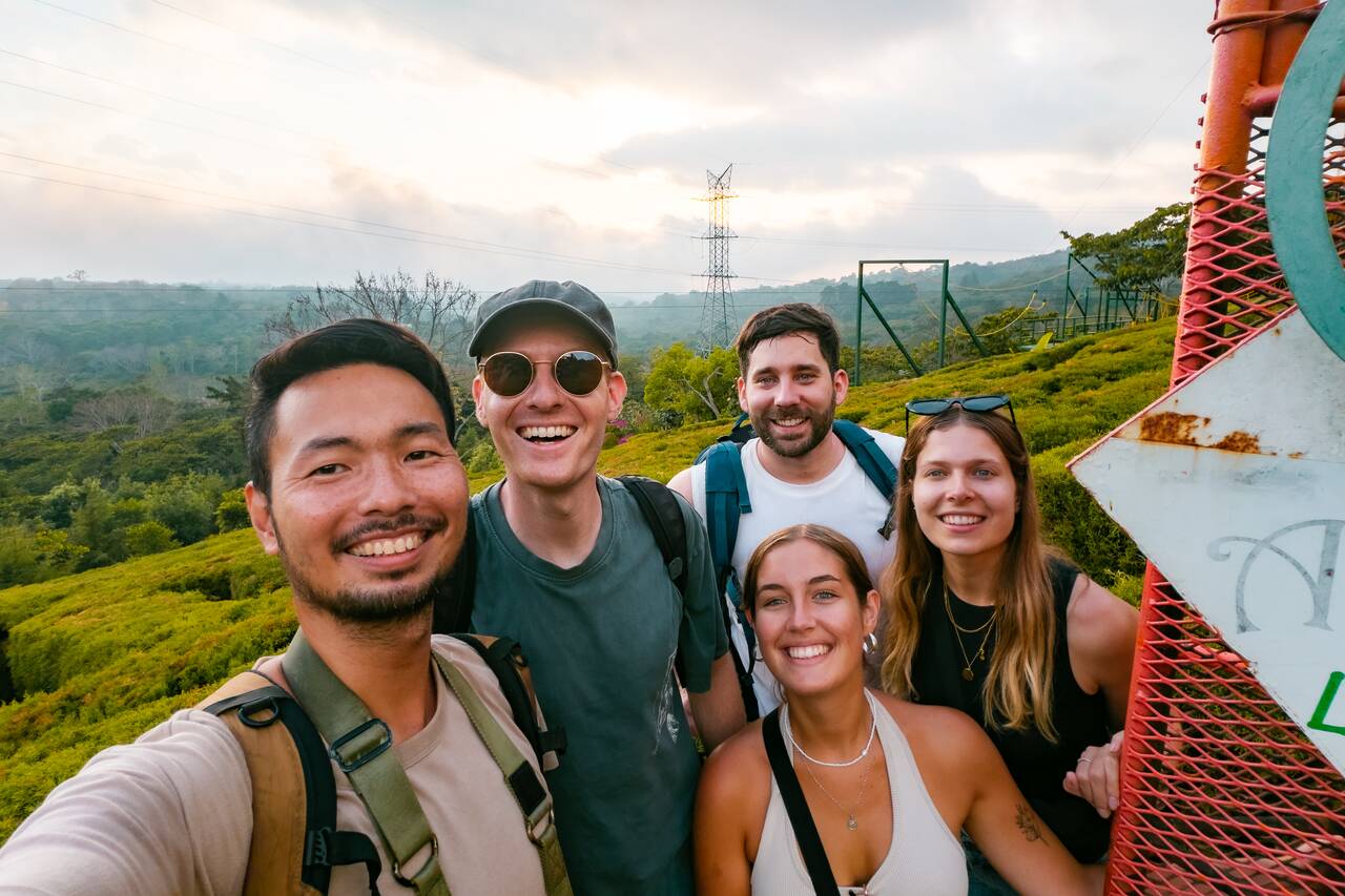 Me and my friends smiling at the camera as I took the selfie