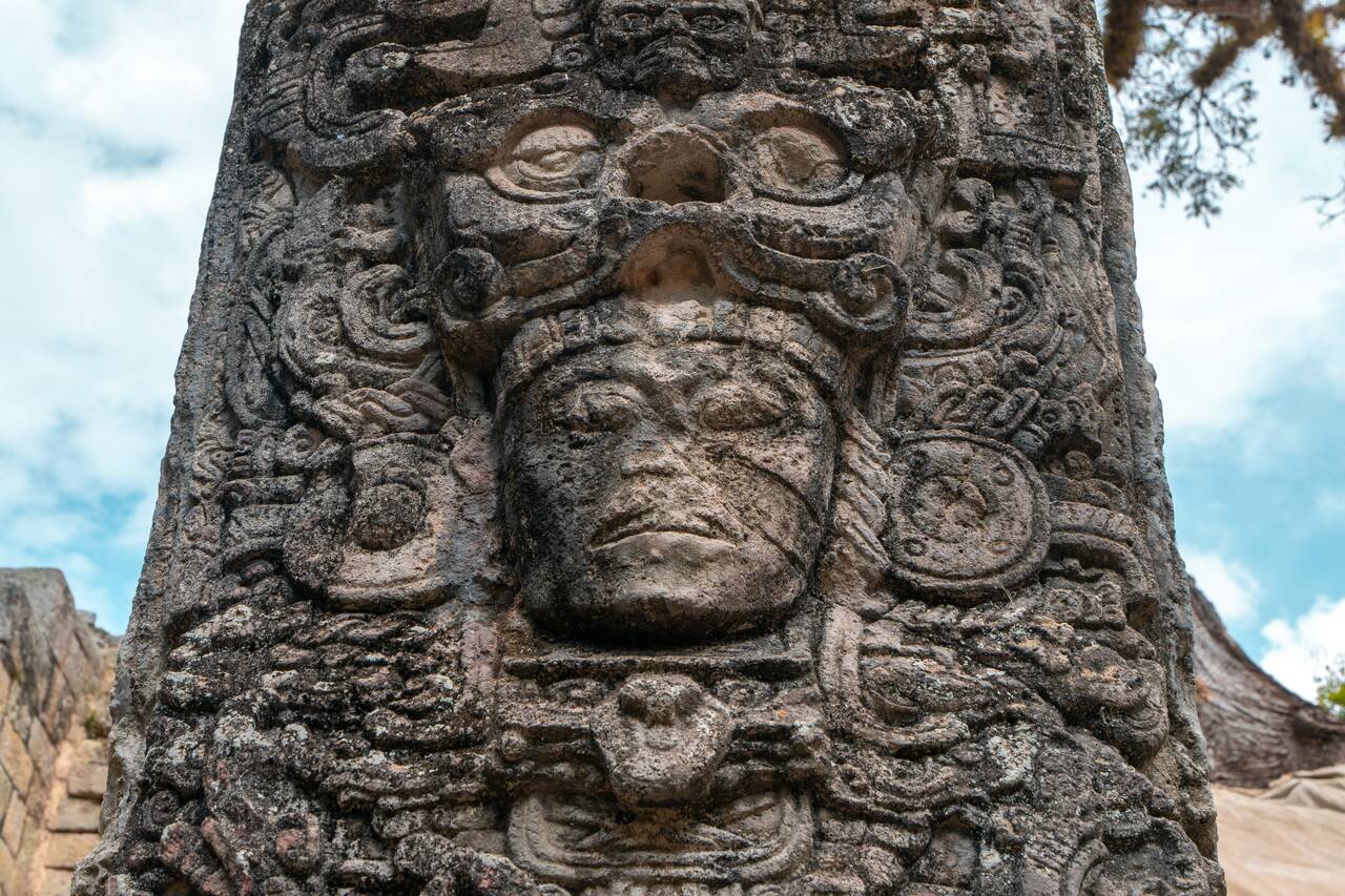 a sculpture inside Copan Ruins and I bought a miniature version of it at La Casa de Todo