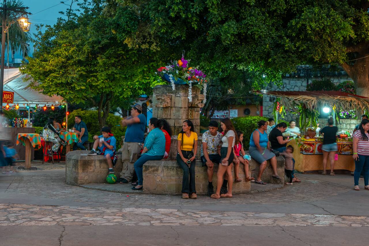 Locals hanging out at Parque Central in the evening