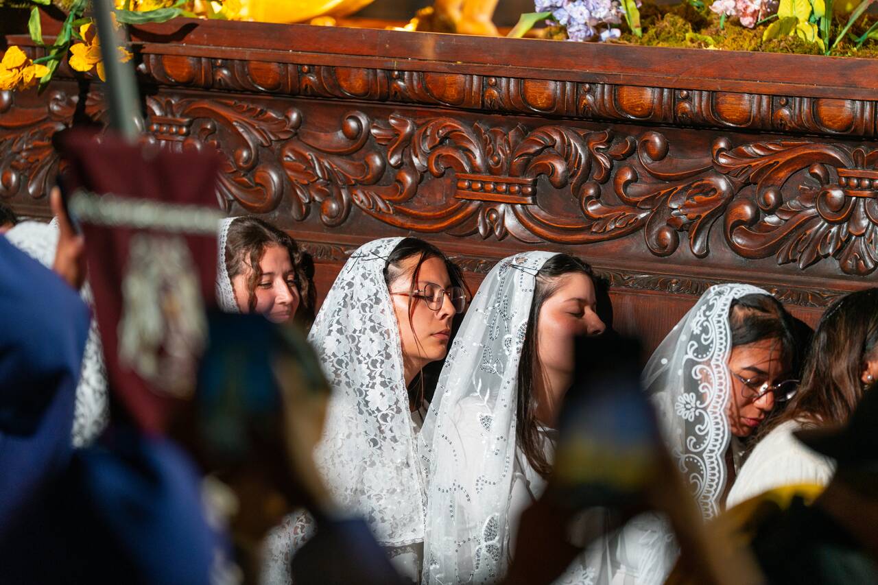 Women carrying a float in Antigua during Semana Santa