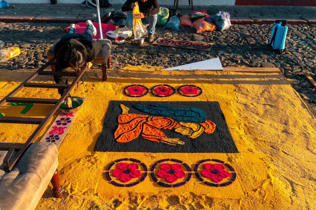 A woman preparing the carpet in Antigua during Semana Santa