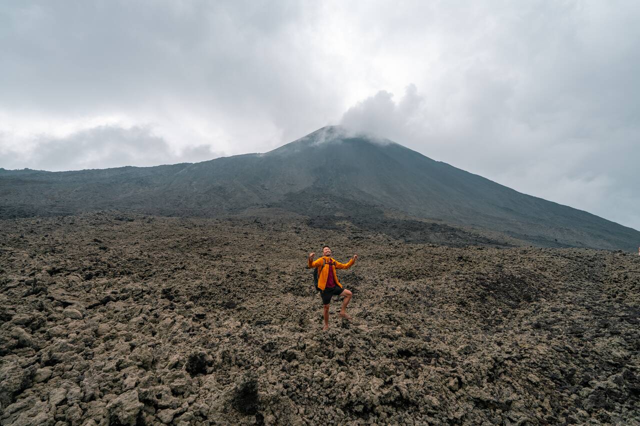 Me cheering after arriving at the viewpoint on Pacaya Volcano