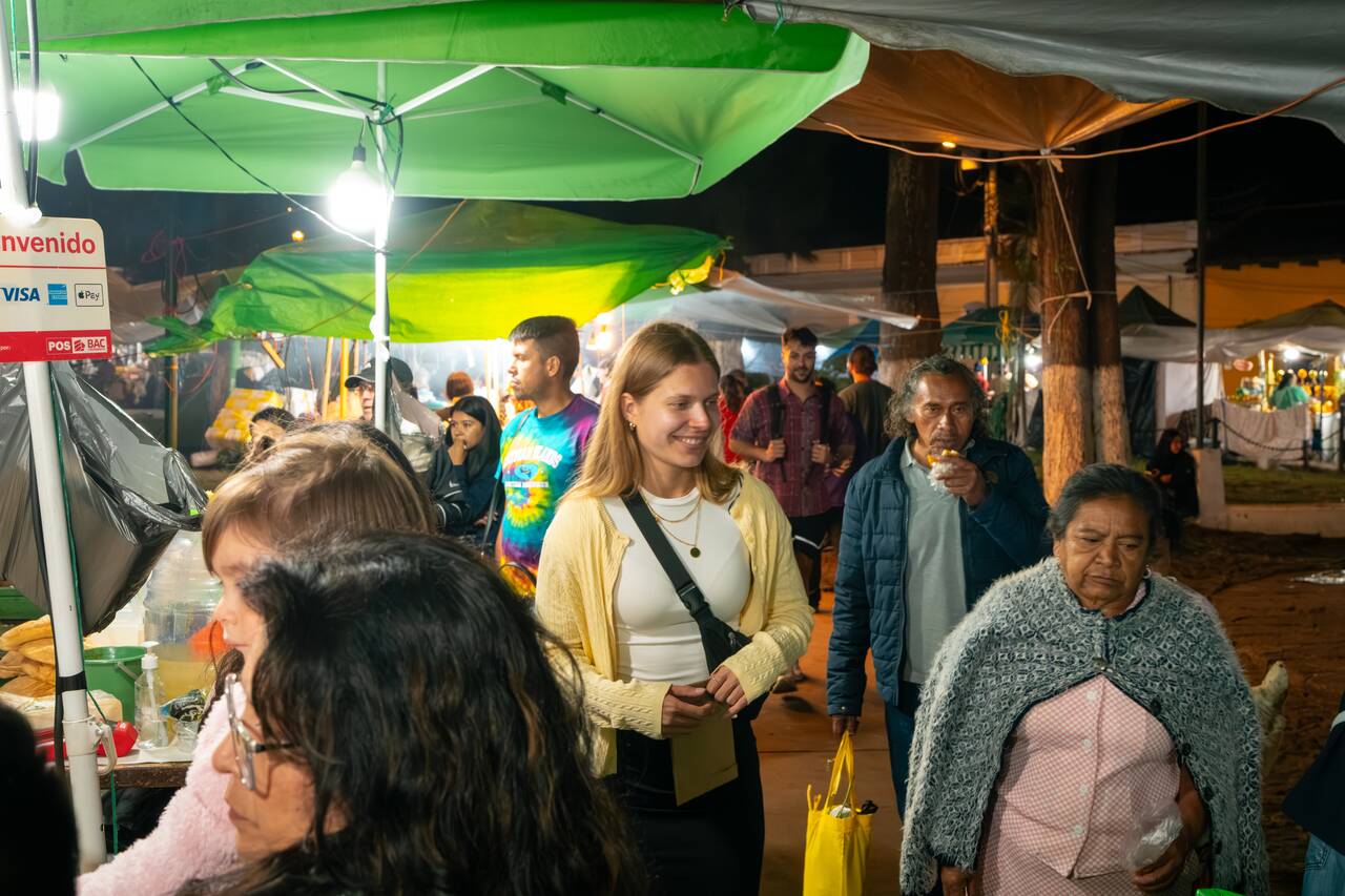 My friend walking around the Weekend Market Next to Iglesia de la Merced