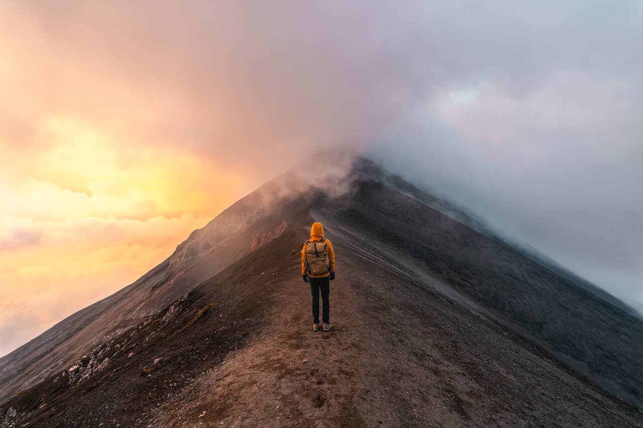 Me looking at Fuego from the viewpoint at sunset