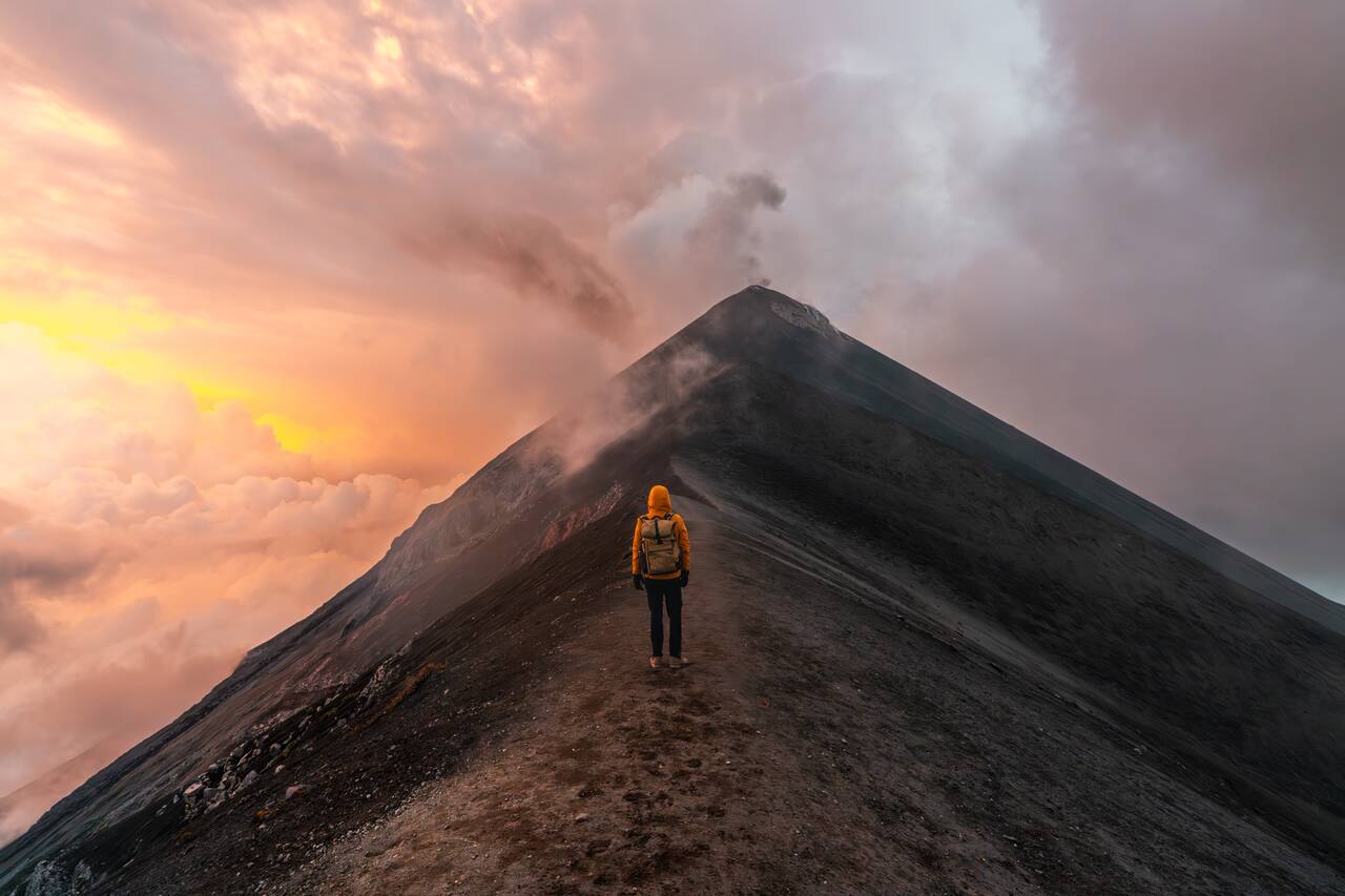 Me looking at Fuego after hiking it at sunset