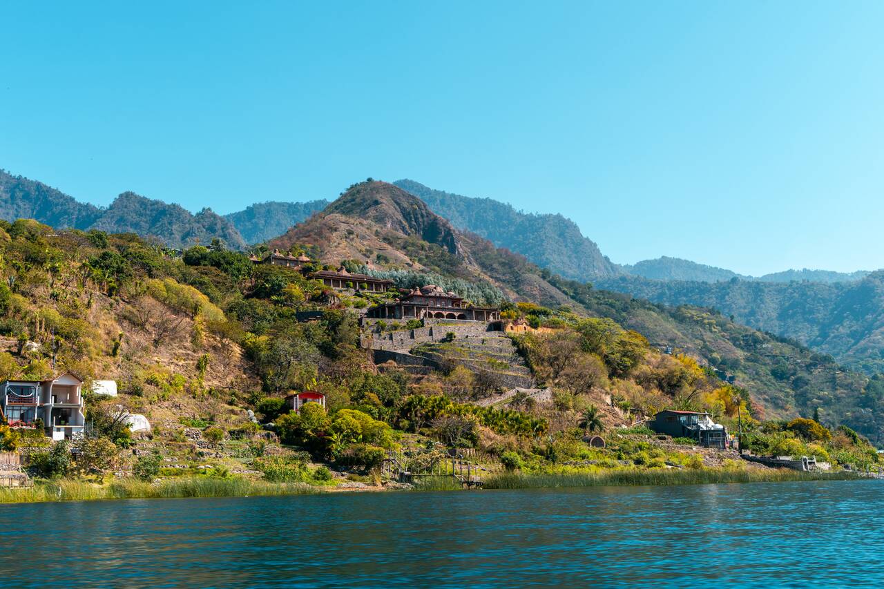 Massive villas seen from the boat at Lake Atitlan