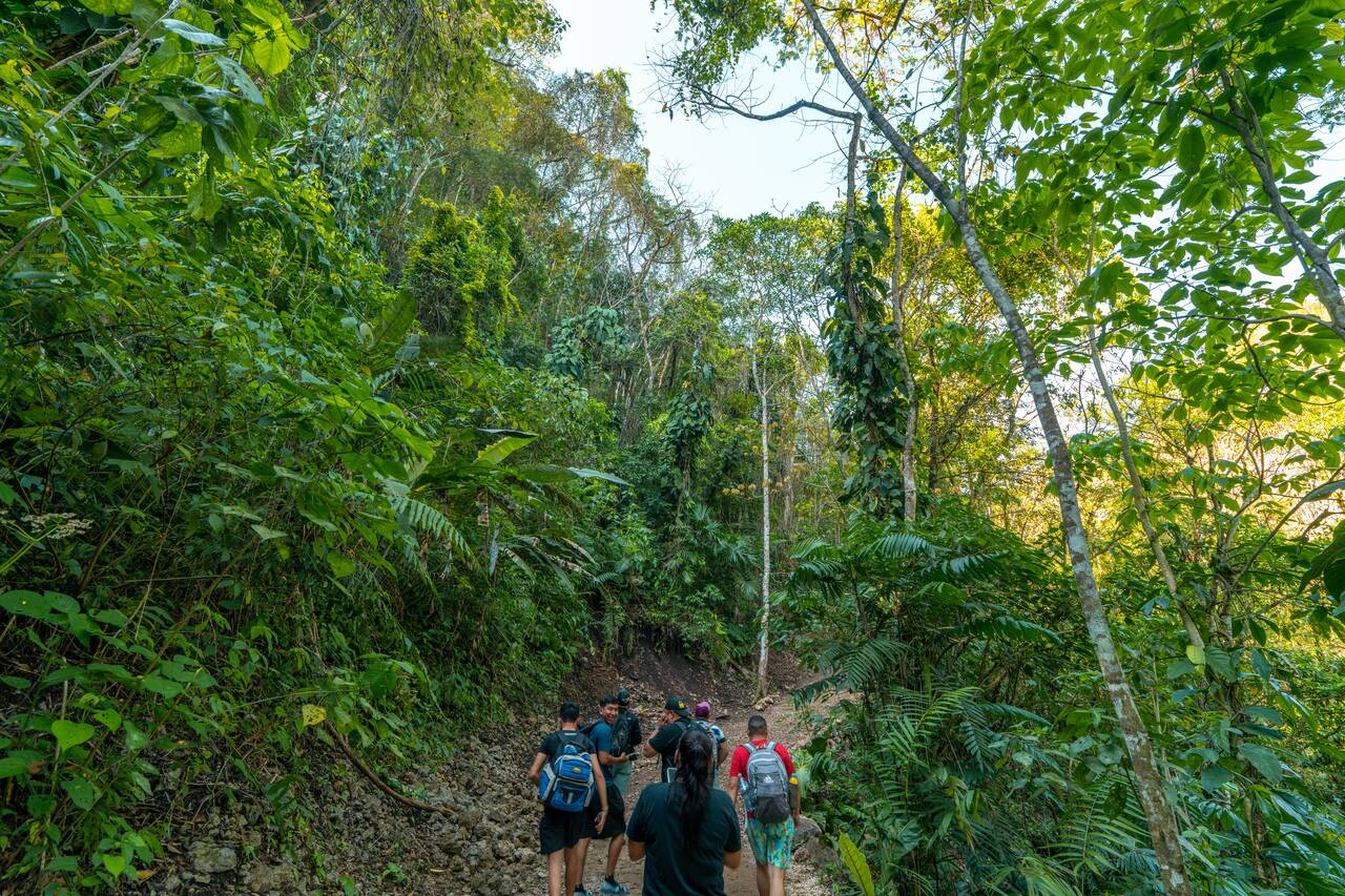 Local tourists hiking in Semuc Champey