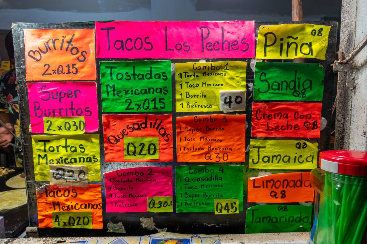 The price list menu at Tacos Los Peches