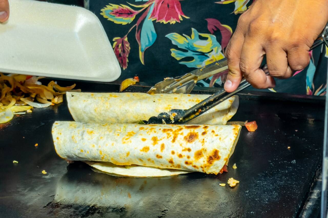 2 super burritos I ordered at Tacos Los Peches