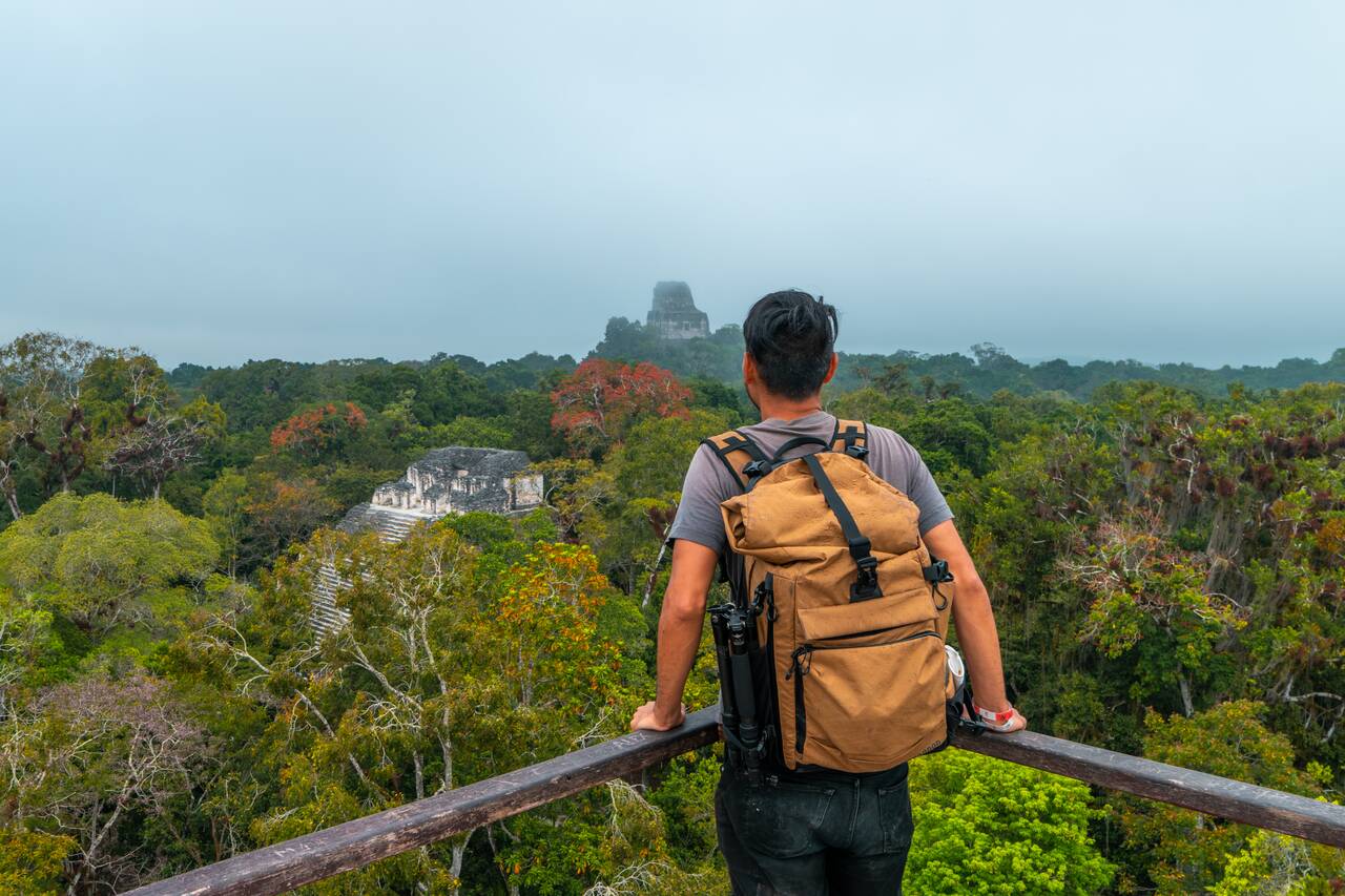 Me looking at the temples amidst the jungle in Tikal from a viewpoint