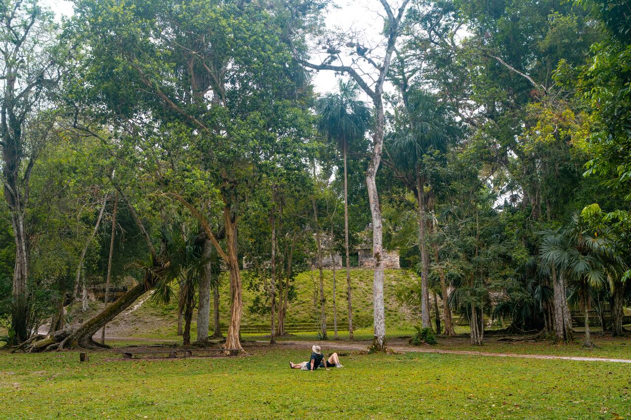 A couple hanging out at the Lost World Complex in Tikal