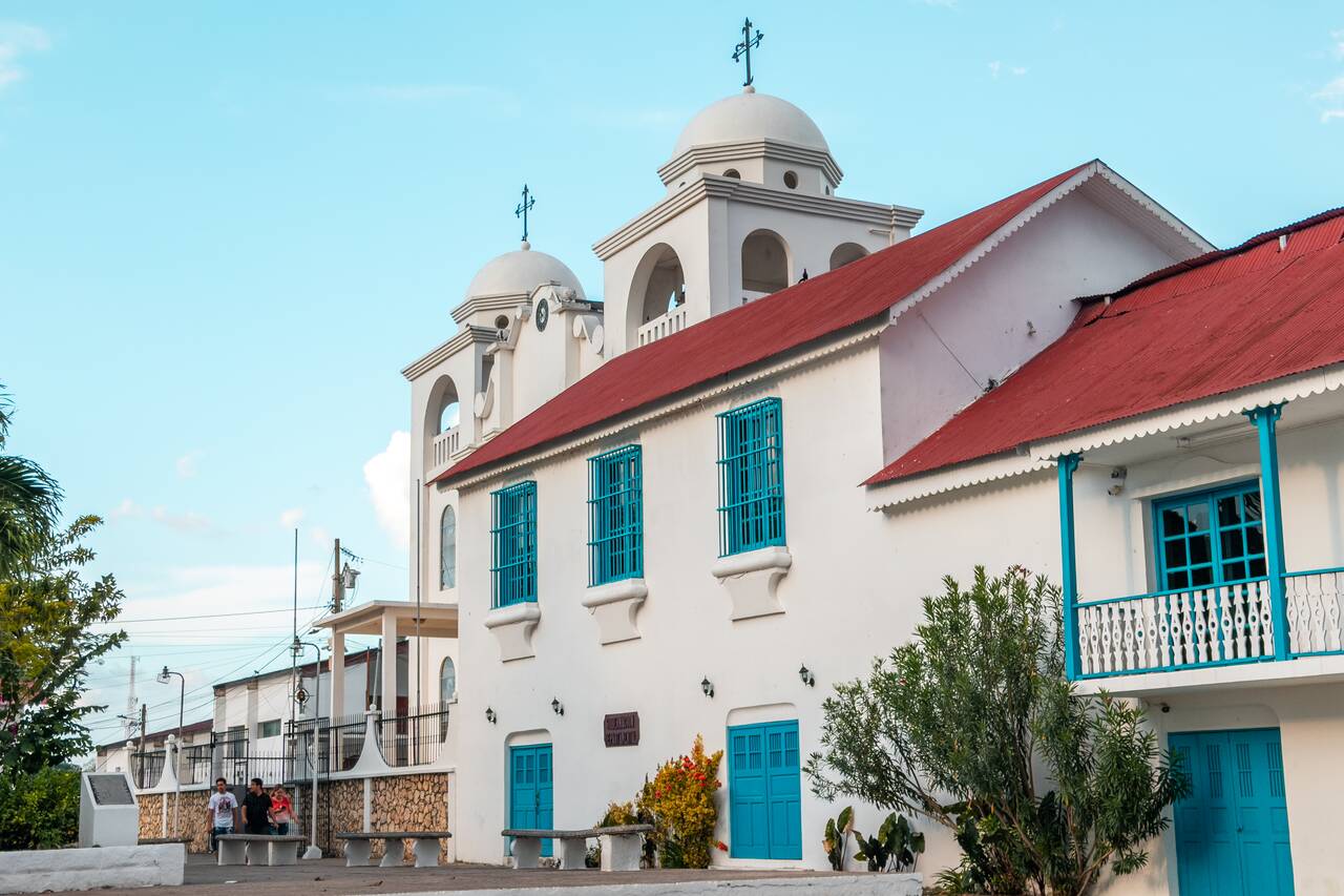 Colonial style building and a cathedral on Flores Island