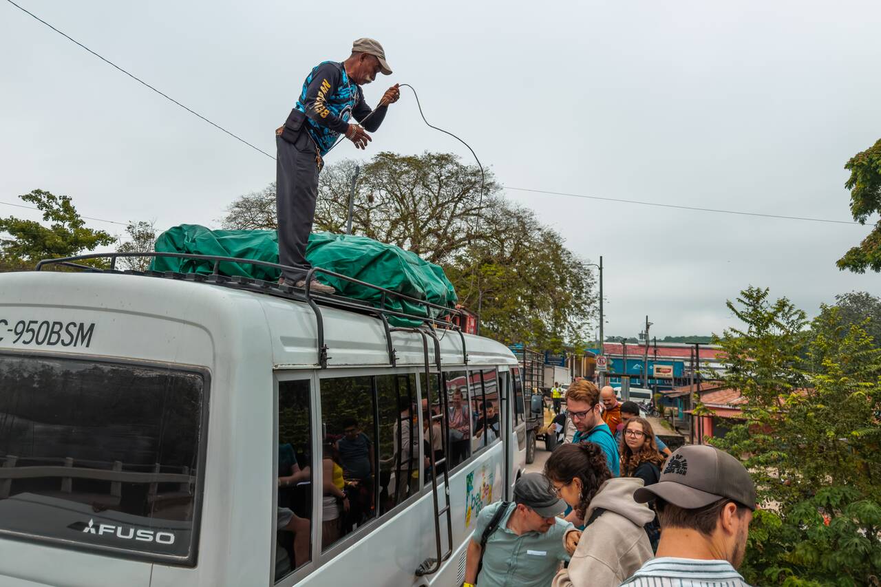 A tourist shuttle from Flores to San Ignacio