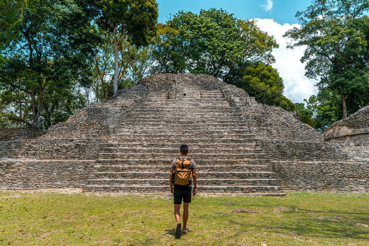 Me walking towards a temple at Cahal Pech