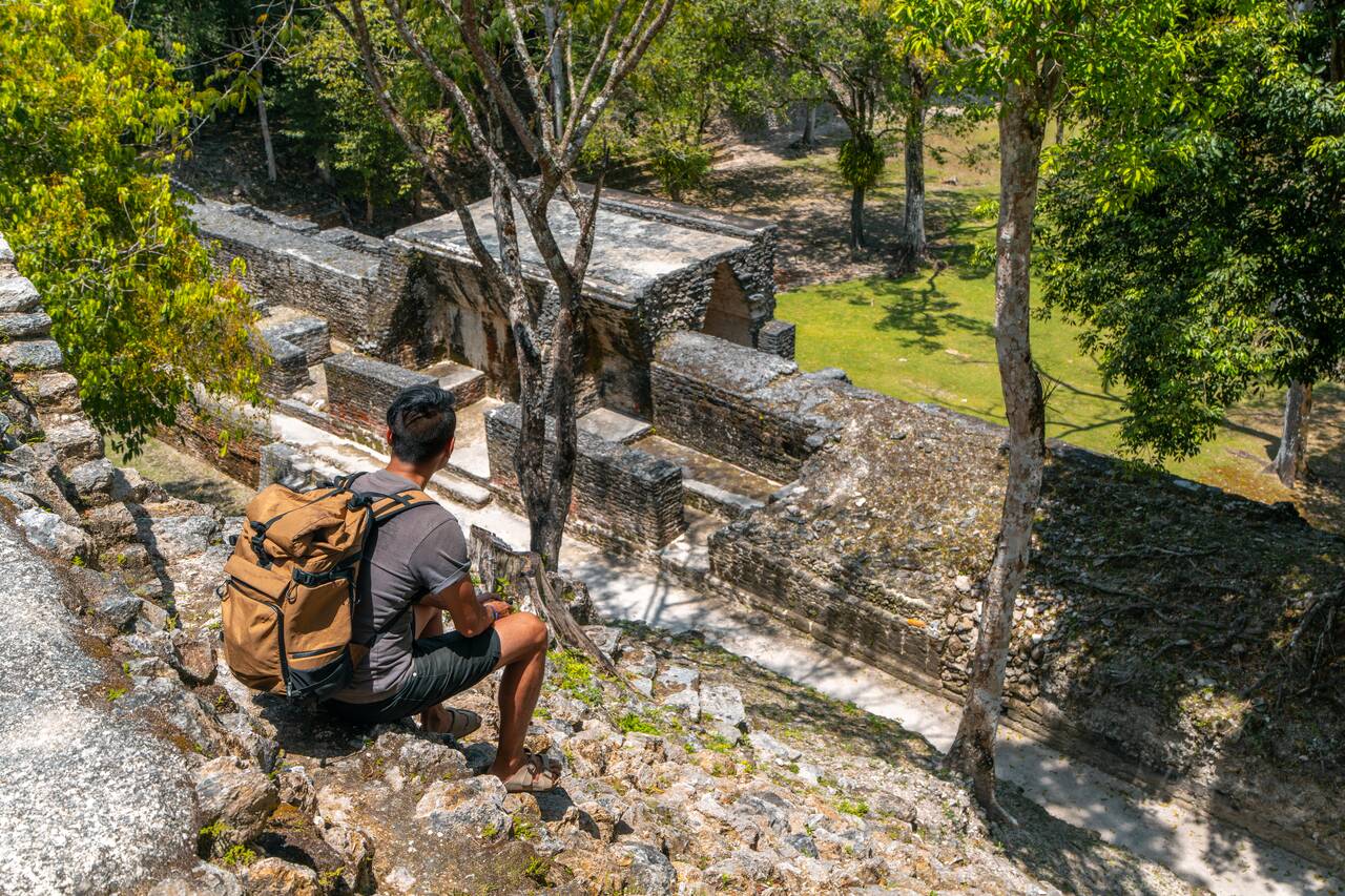 Me sitting from a temple while looking at Cahal Pech