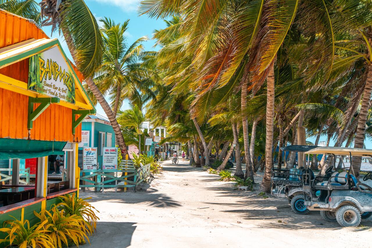 The sandy street of Caye Caulker Village
