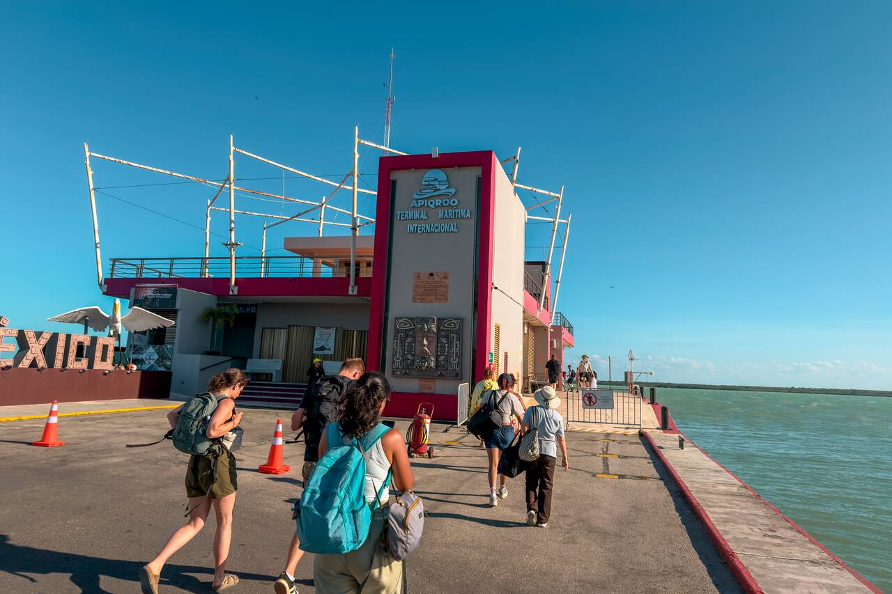 People entering the immigration building at Chetumal Ferry Terminal