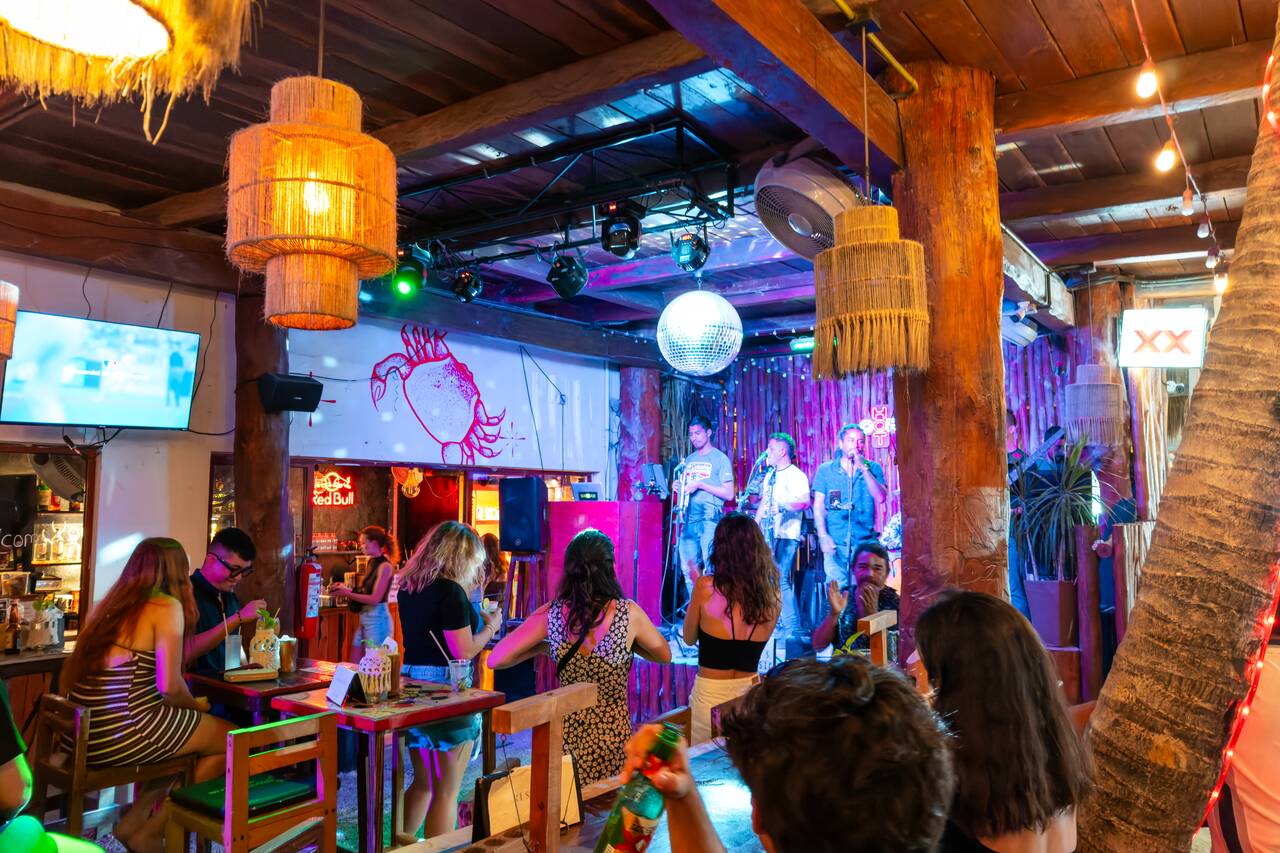 People dancing at the hot corner in Holbox