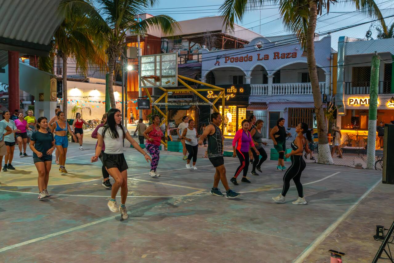 Locals exercising at Central Park in Holbox