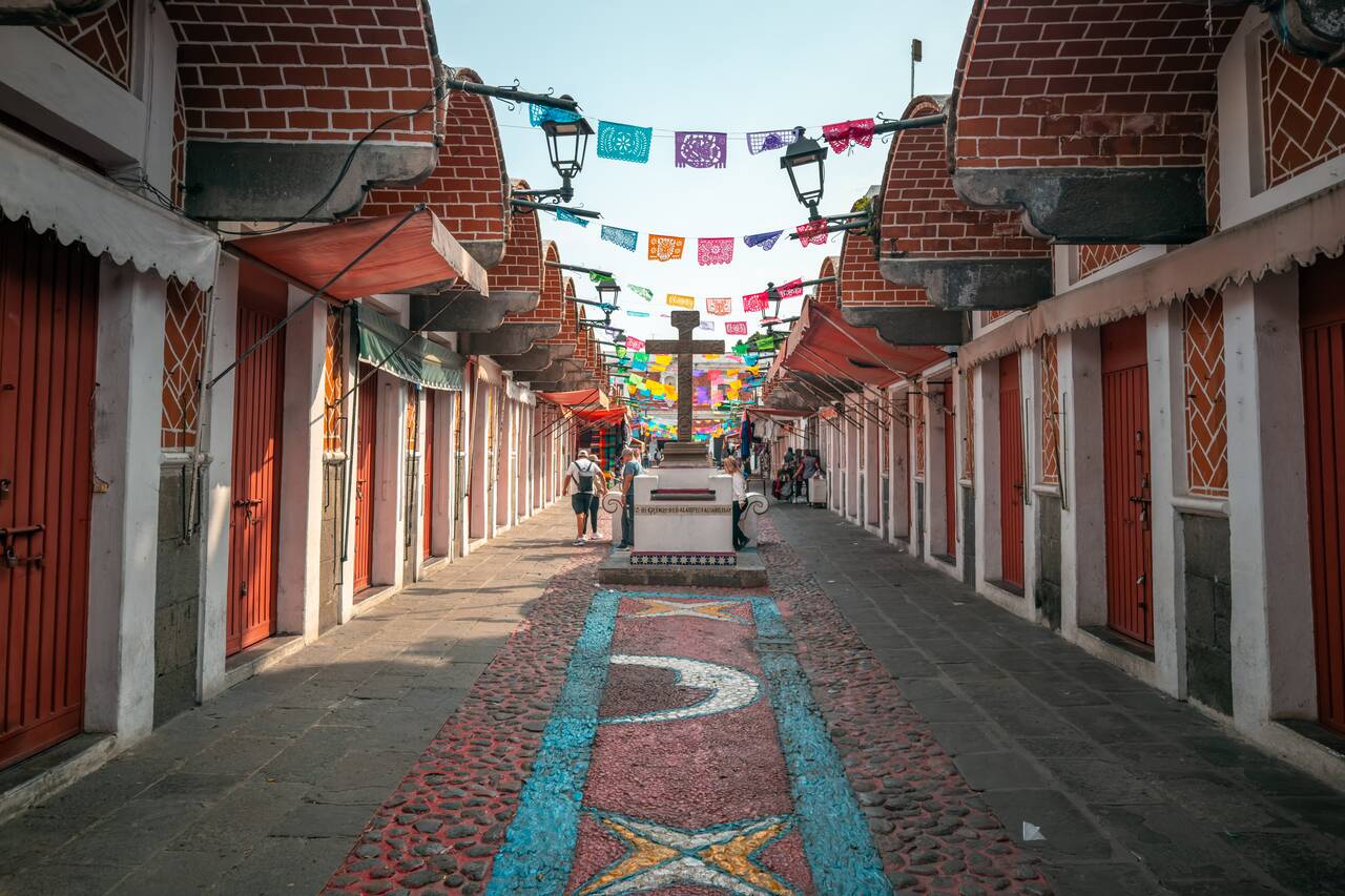 A person walking along the Artist Quarter