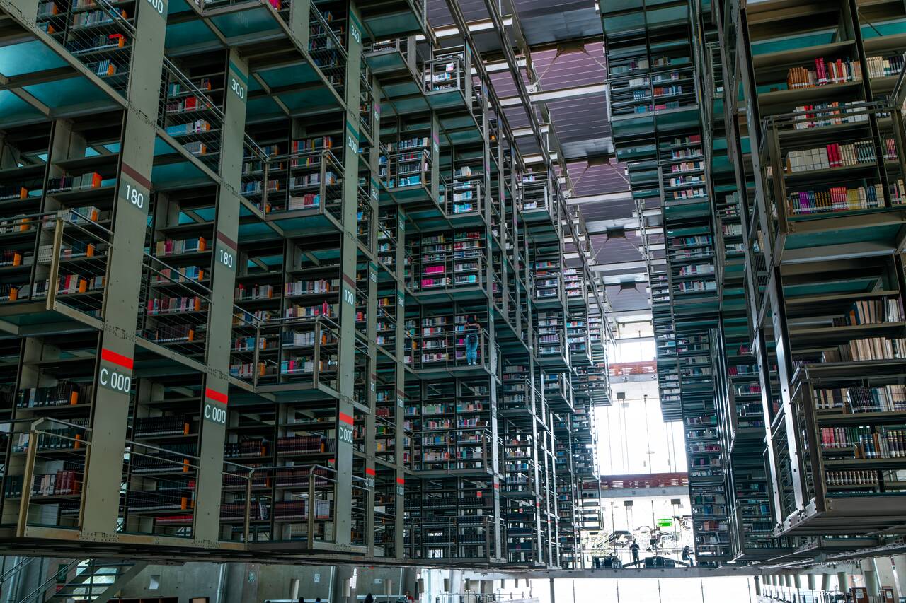 The elevated bookshelves seen from the bottom at Biblioteca Vasconcelos
