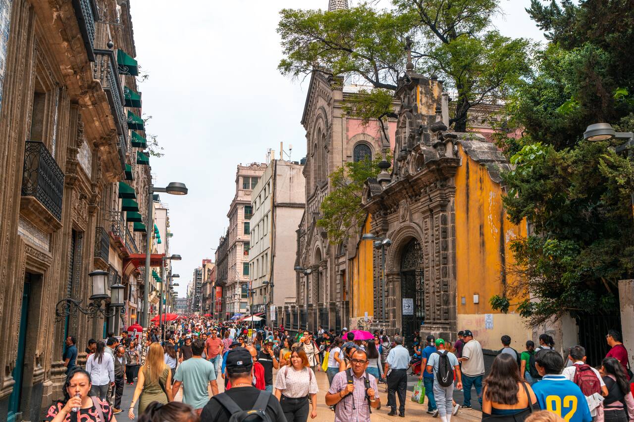 The busy street connecting the Zócalo to Palacio de Bellas Artes