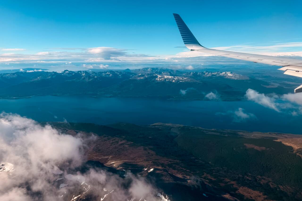 A plane flying over Ushuaia