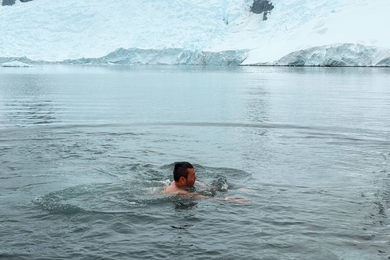 Me swimming in the ice cold water of Antarctica