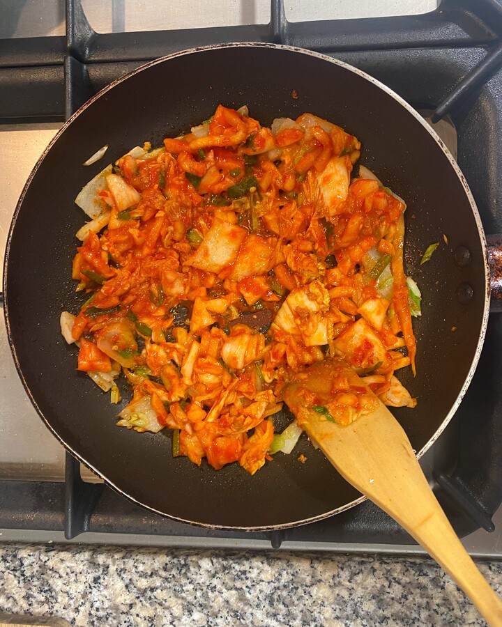 Add 1 cup of chopped kimchi and stir-fried for a few minutes.