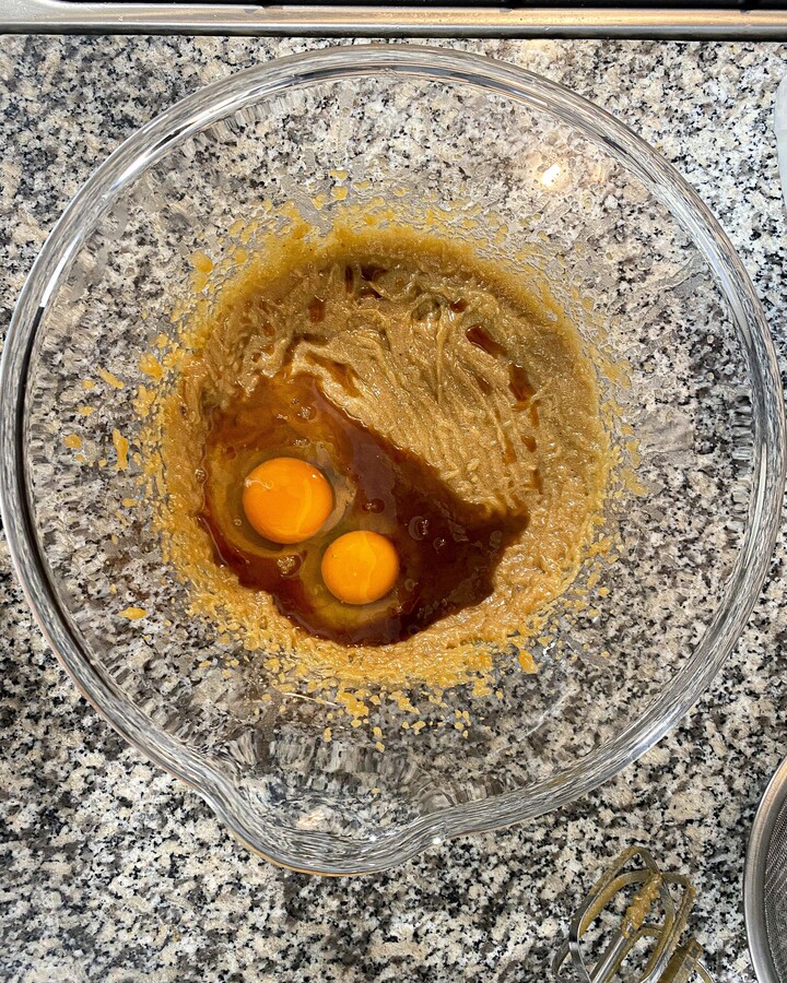 Add eggs and vanilla extract and whisk it until it mixes well together with butter and sugar. Mix it until it's a lightly little brown. Don’t forget to scrape down the side of your bowl and mix one more time. Add eggs and vanilla extract and whisk it until it mixes well together with butter and sugar. Mix it until it's a lightly little brown. Don’t forget to scrape down the side of your bowl and mix one more time.