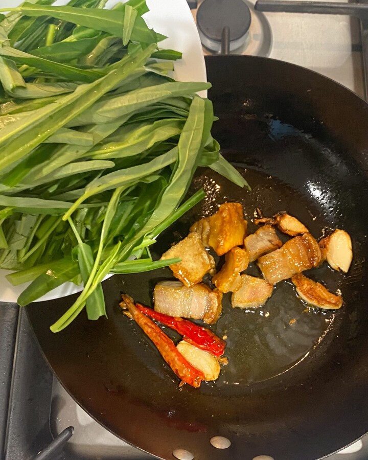 Add the water spinach.