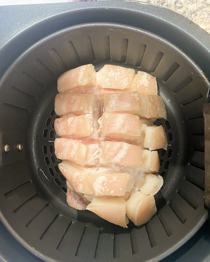 To make a pork belly dry out and create more crispy skin, place the pork belly into an Air fryer. Let the meat side down and set up the heat for 80º C for 60 minutes.