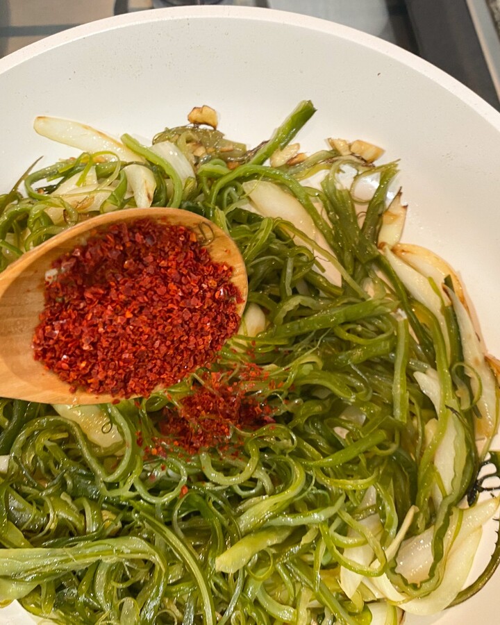 Add Korean Chili flakes. This is opional if you like spicy. Adjust seasoning to your taste. And then keep stir them for another 3 minutes.