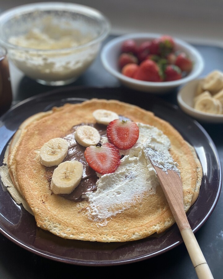 Serve with your favorite toppings. I love serving them warm with cold whipped cream and chocolate. Then topped with some banana and berry. YUM!!