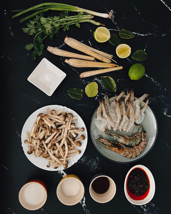 To prepare the prawns for this recipe, start by removing the head, shell, and antennae from the large ones and just the head, shell from the medium ones. Then, devein the prawns and rinse them thoroughly. This will help to ensure that the prawns are clean and ready to be added to the soup.