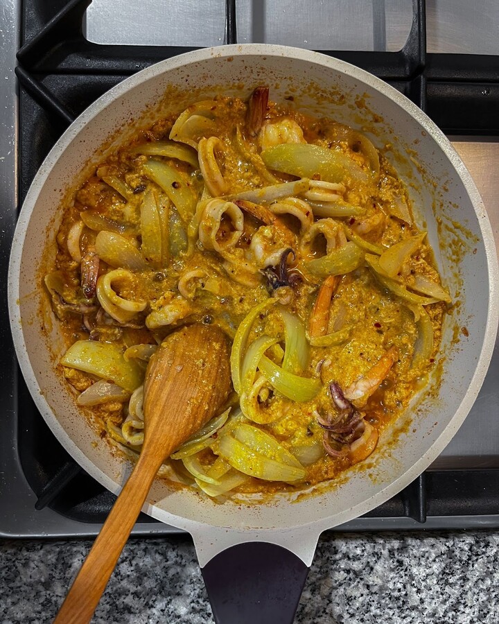 Keep stirring for 2-3 minutes to let the onions be coated with the mix sauce.