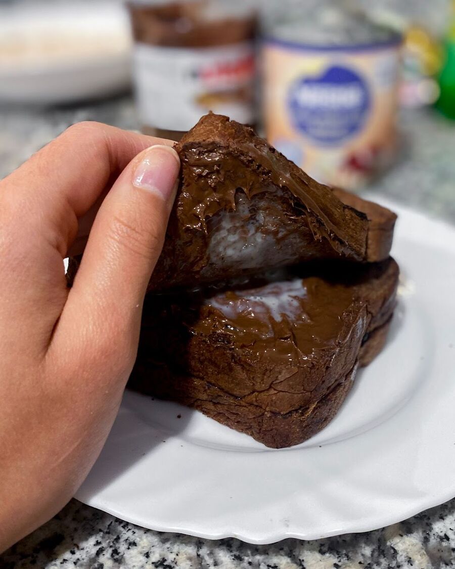Bring the slices of bread together.