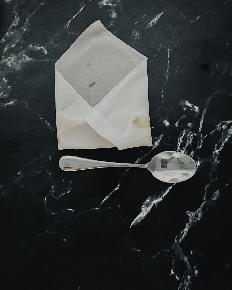 Then, fold the left and right sides of the wrapper towards the middle. Using a teaspoon can help ensure consistent length for the spring rolls.