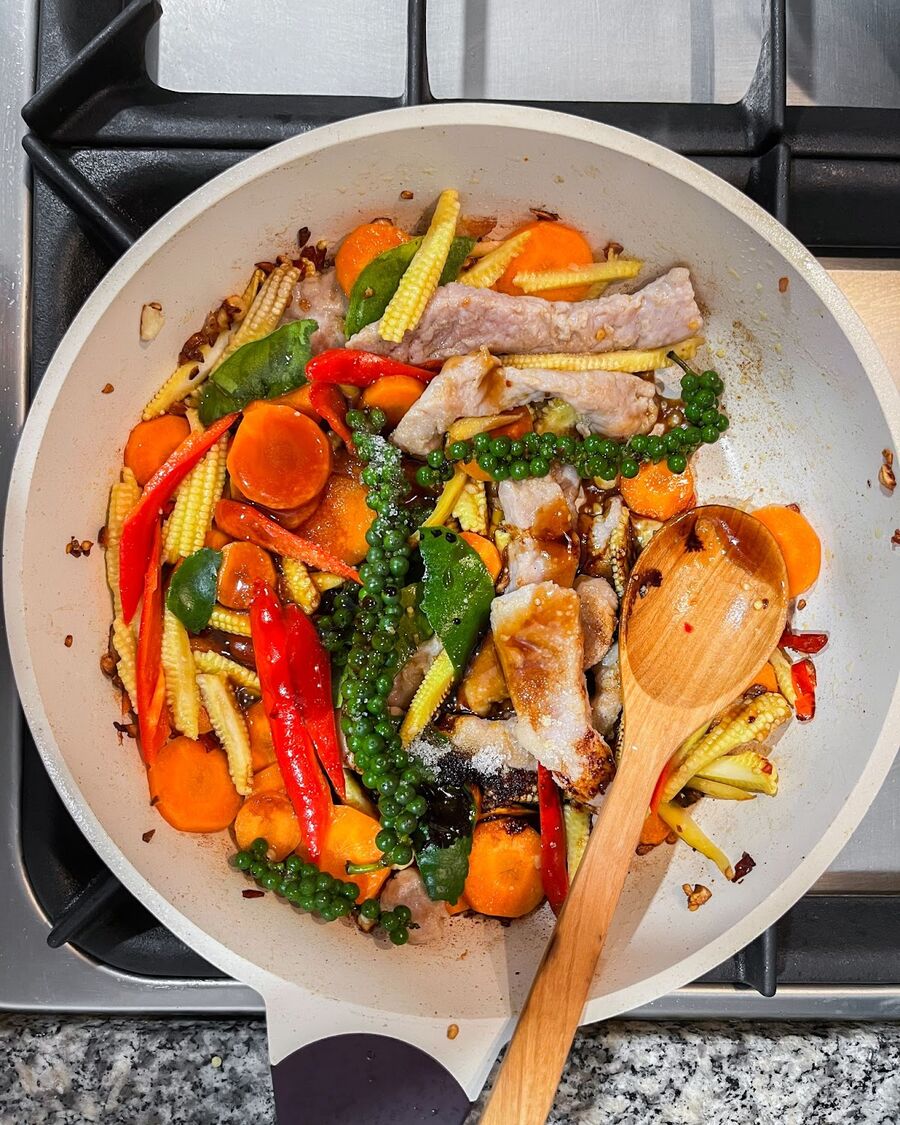 Continue stirring and add the sauce to the pan with the other ingredients.