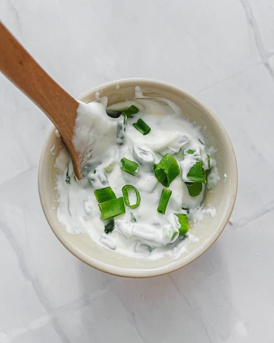 Fire up the oven to 175° and let it preheat for 15-20 minutes. While you're waiting, prep all your ingredients by mixing the cream cheese with spring onion to create a delicious blend.