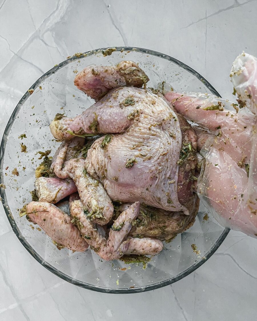 Use your hands to evenly coat the chicken with the marinade. Make sure all ingredients are fully incorporated with the meat. Cover the chicken with plastic wrap and refrigerate for at least 1 hour or overnight.