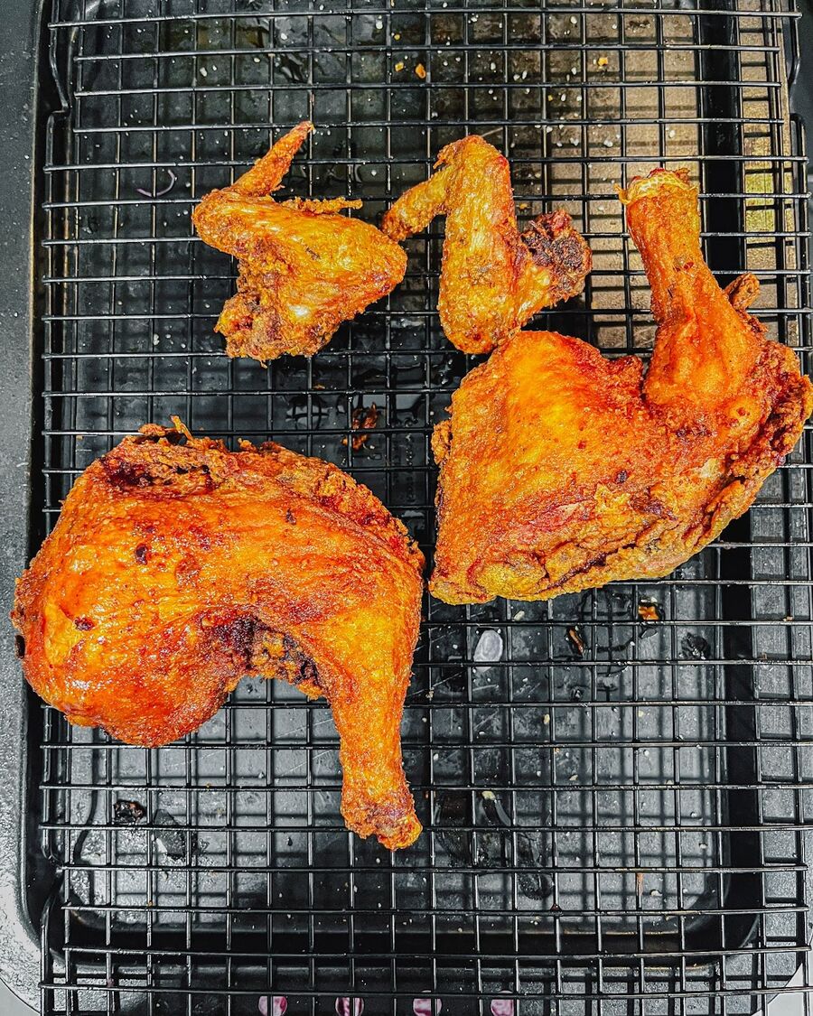 Allow the chicken to cool and rest on a rack.