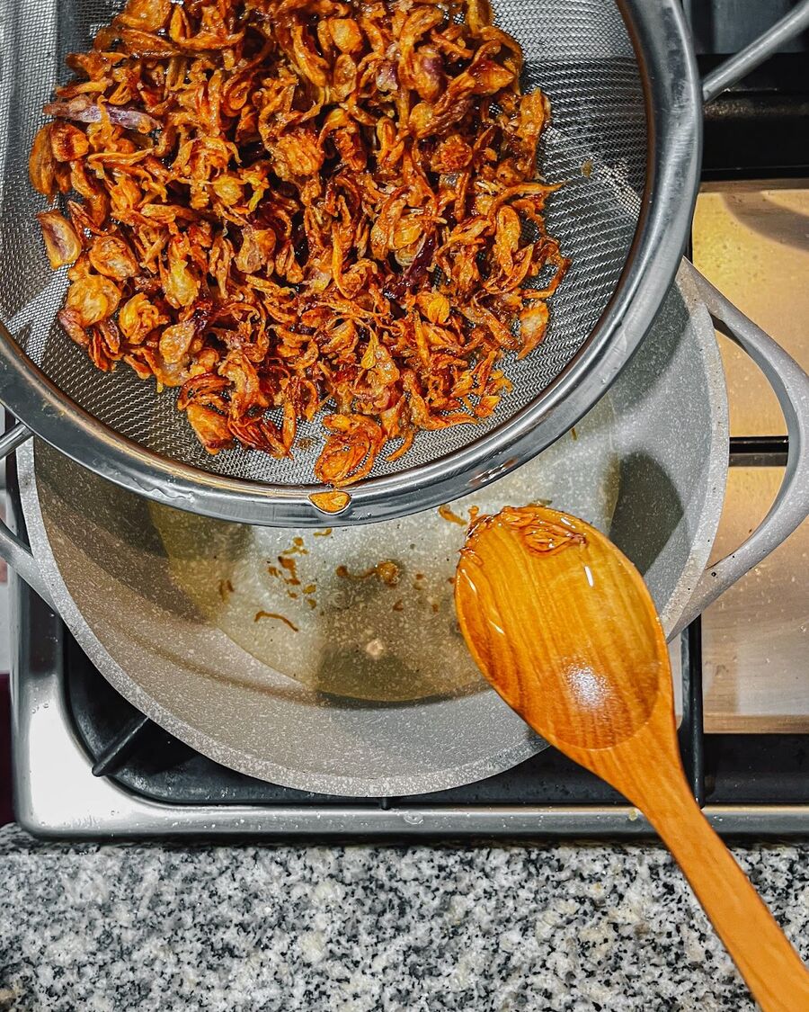 Immediately remove the shallots from the oil and drain them thoroughly. The shallots will continue cooking from residual heat, so be careful not to let them stay in the oil for too long after they turn golden brown.